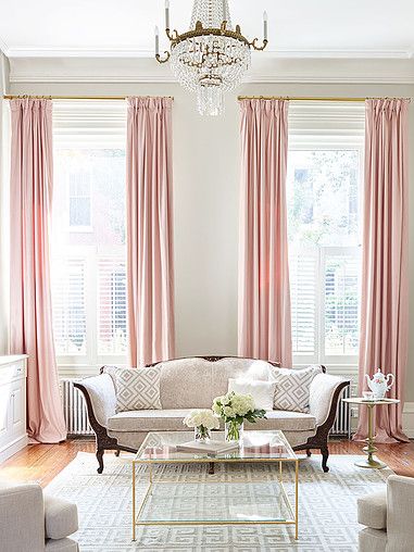 traditional living room with pink curtains