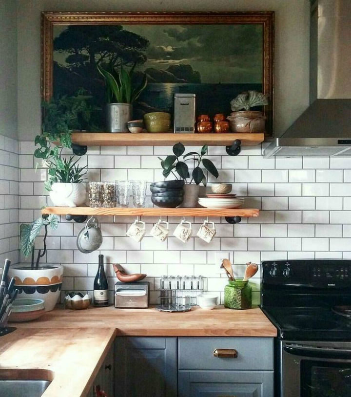 gray bohemian kitchen with wood open shelves