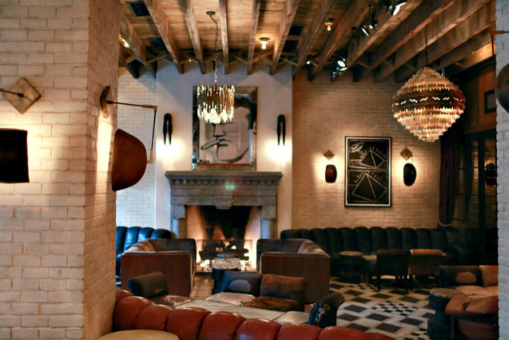 The love child of New York hoteliers Sean MacPherson, Ira Drukier, and Richard Born, the hotel also evokes the neighborhood’s rich history—from the “Gangs of New York” era to Jewish immigration to the wild art and music scenes. The stunning result is seen as soon as you walk through the steel and glass doors of the lobby into a lounge with oak-paneled walls, antique chandeliers, and Parisian- and New Orleans-inspired craft cocktails. The 175 rooms have a lofty industrial vibe with big casement windows—many affording impressive views of the New York skyline—furry throws on chairs, and lavish bathrooms. And the hotel’s eagerly awaited restaurant, Dirty French by Major Food Group, serves Gallic classics with a New York The Ludlow Hotel