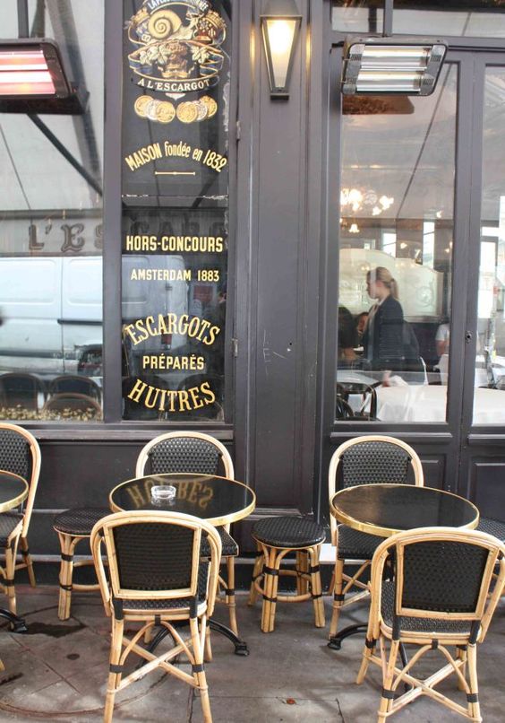 tables and chairs in a French bistro style