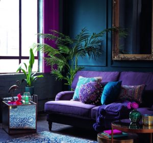 living room with violet purple sofa