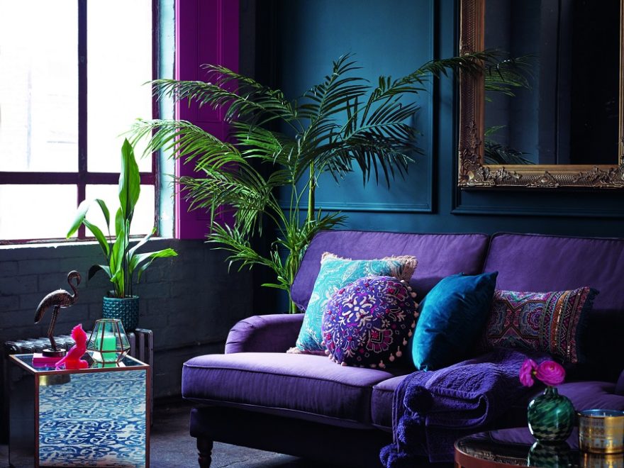 living room with violet purple sofa