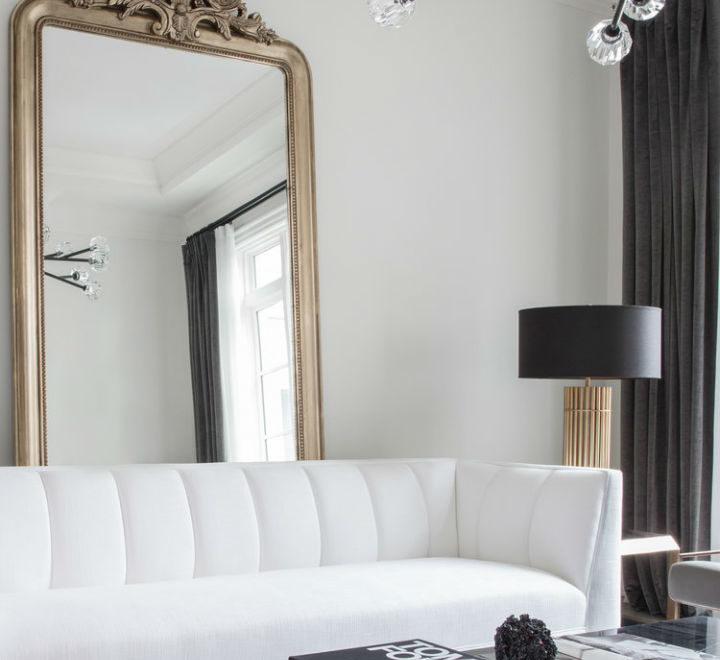 white sofa and a mirror