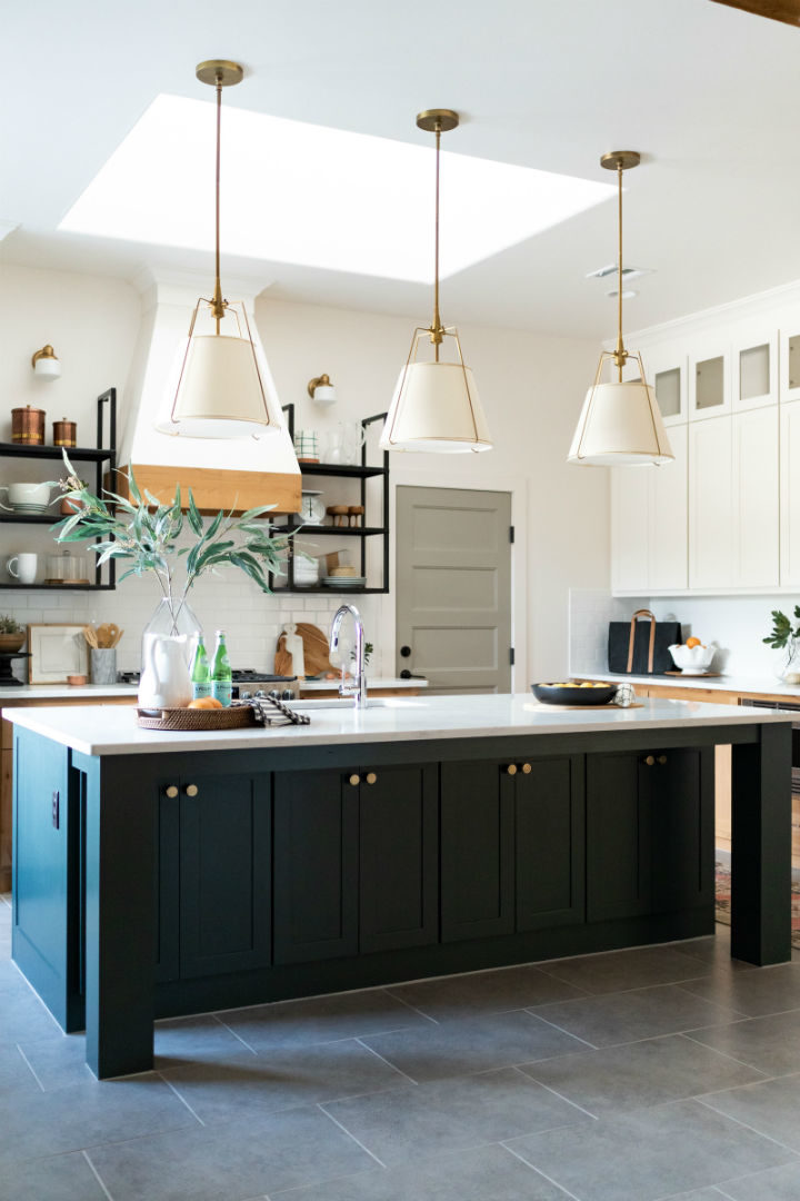 blue cabinets in a white kitchen