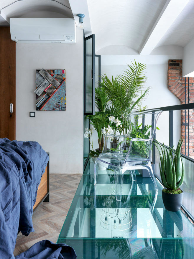 loft bedroom with glass flooring