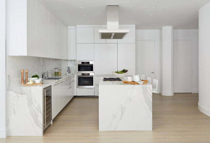 white kitchen counter and cabinets