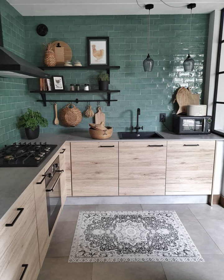 modern wood kitchen with green tiles