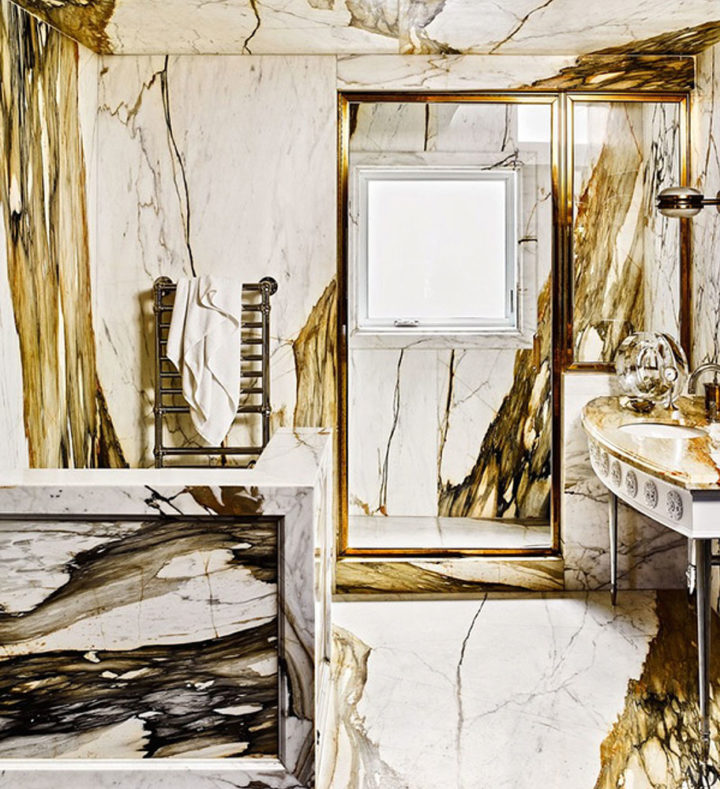 brown and white marble surface in bathrom