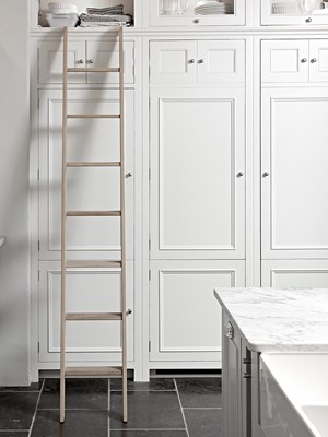 rail designed along the top of a run of full-height cabinets