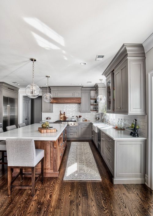 gray kitchen cabinets with wood island