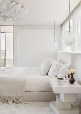white bedroom with double bed