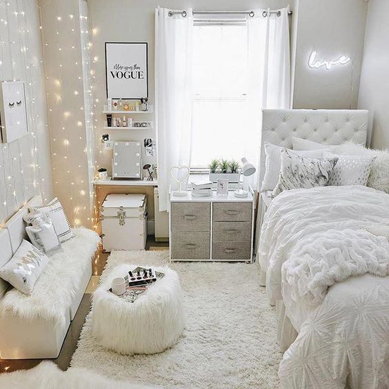 decorative lights and rugs and throws of white color