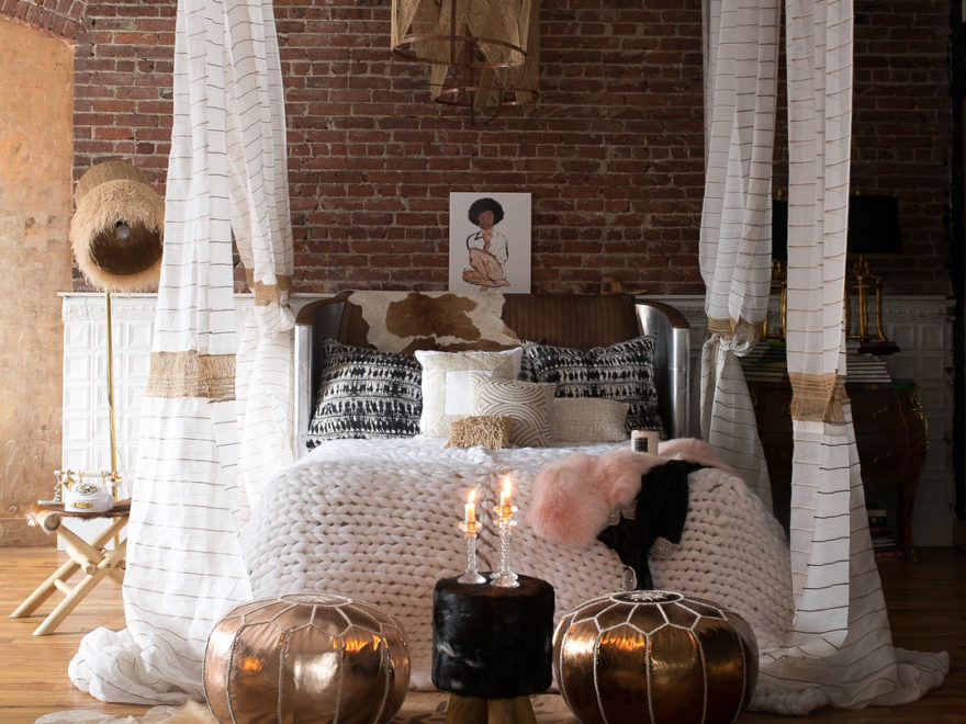 personal eclectic interior design style bedroom with brick walls