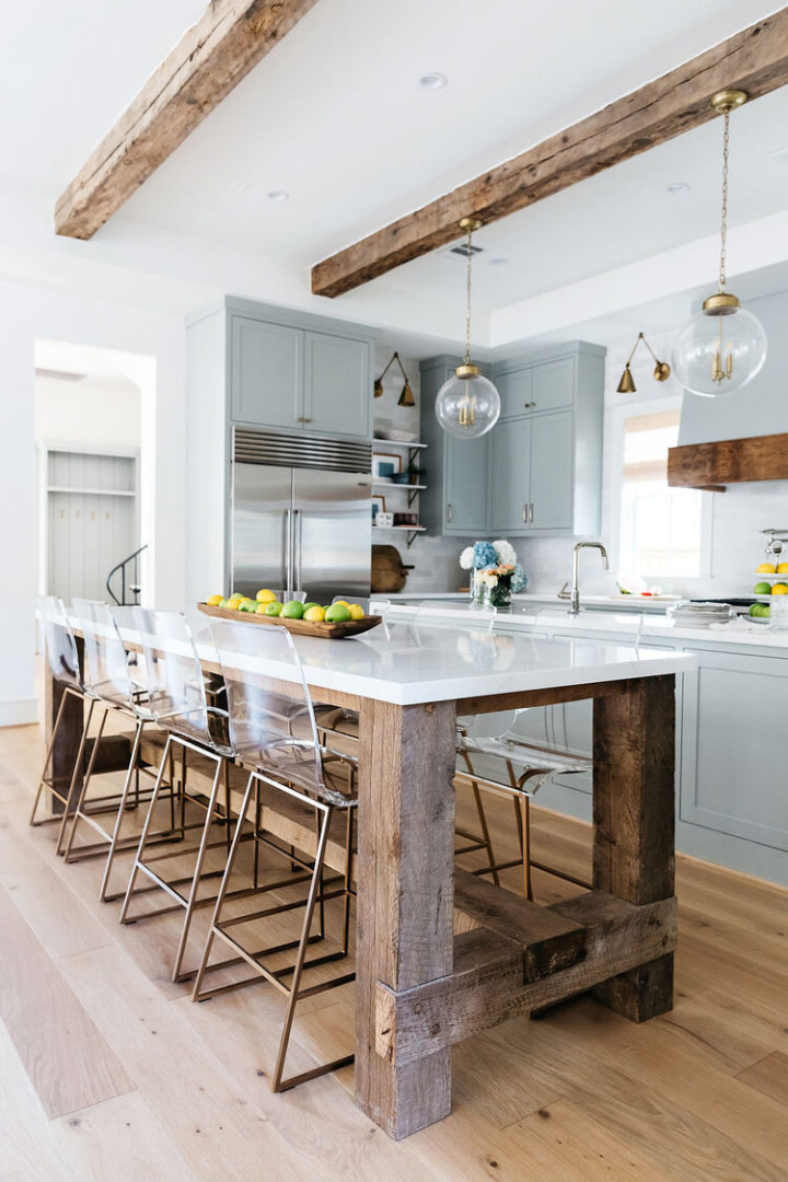 light blue grey kitchen-with reclaimed wood island with white marble worktop and Clear Acrylic Stools
