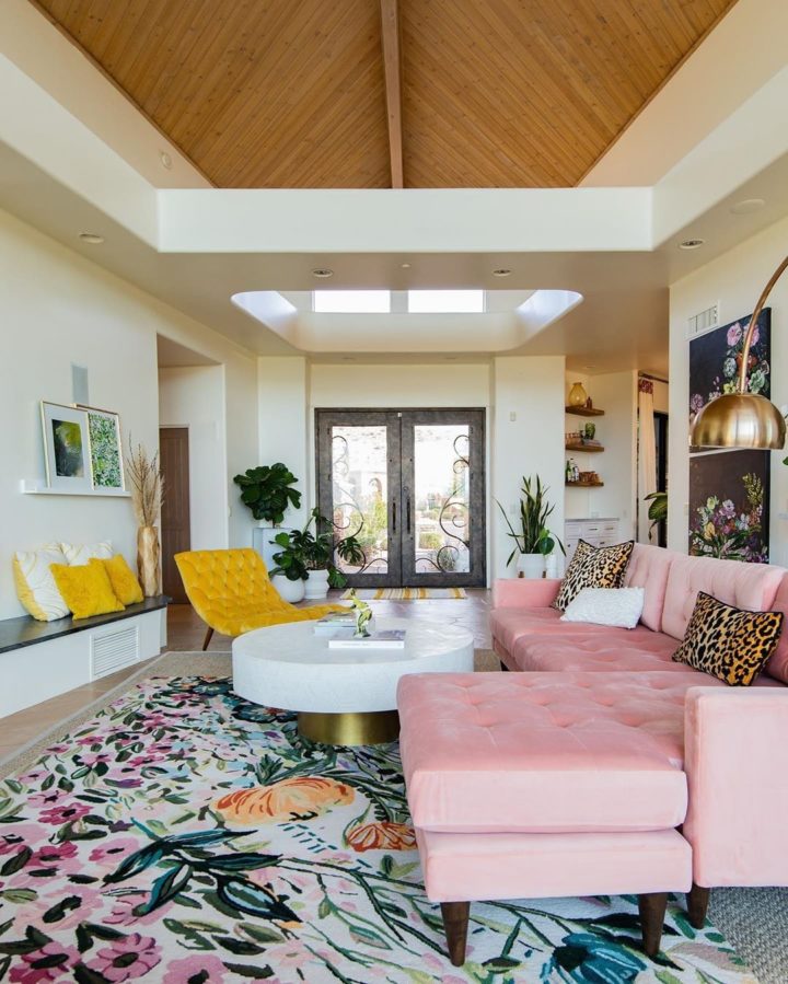 pink-velvet-sectional-sofa-with-animal-print-pillows