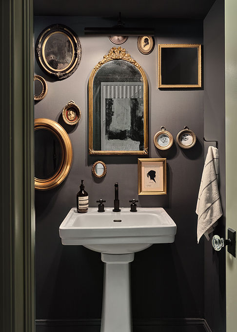small-black-bathroom-with-gold-small-mirrors