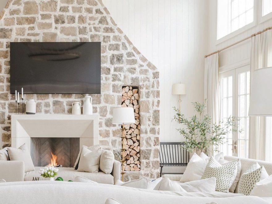 One-Of-A-Kind Classic Interior living room with unique stone fireplace