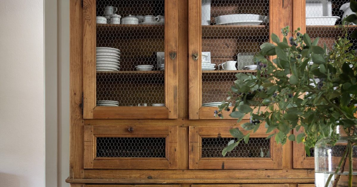 chicken wire farmhouse wood kitchen cabinets