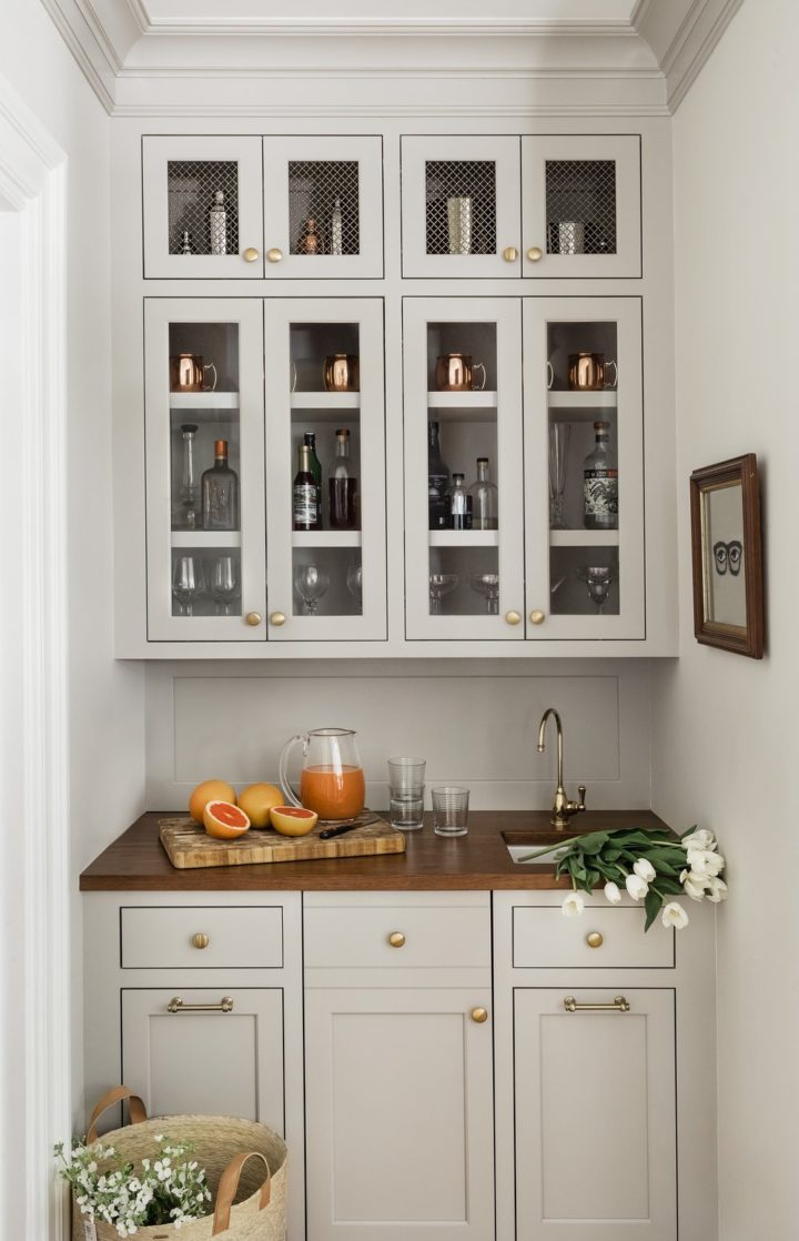 white wet bar with wood counter