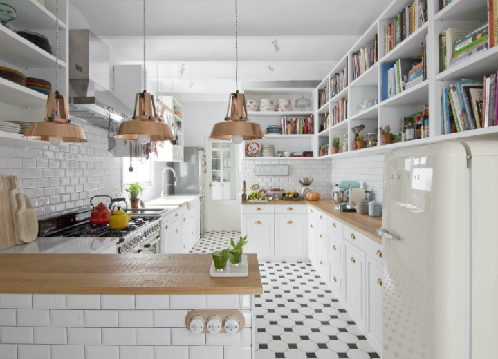 white open kitchen with different black and white fllooring