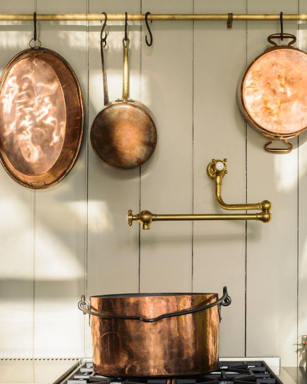 pot filler tap and copper pots display