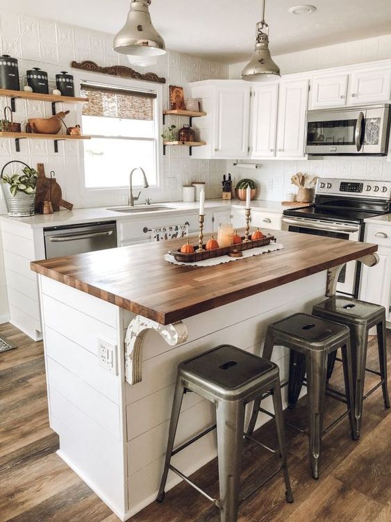 modern farmhouse white kitchen with island and wood countertop
