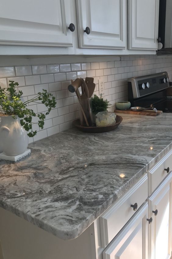 white kitchen with Gray Granite Countertop