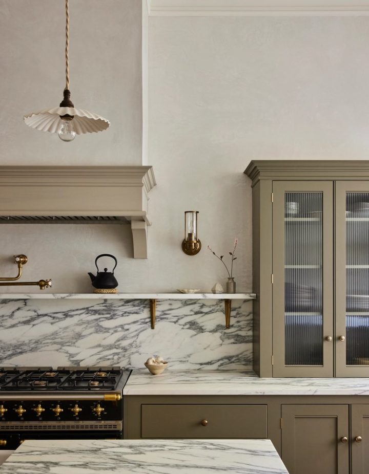 classic English style grey green kitchen with marble countertop