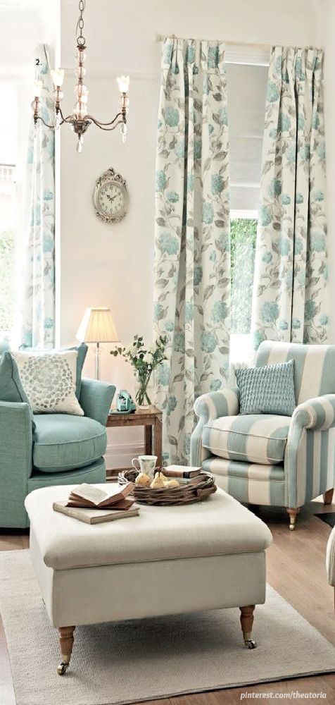 living room in baby blue with mixing different patterns