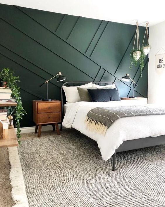 bedroom with dark green  Accent Wall