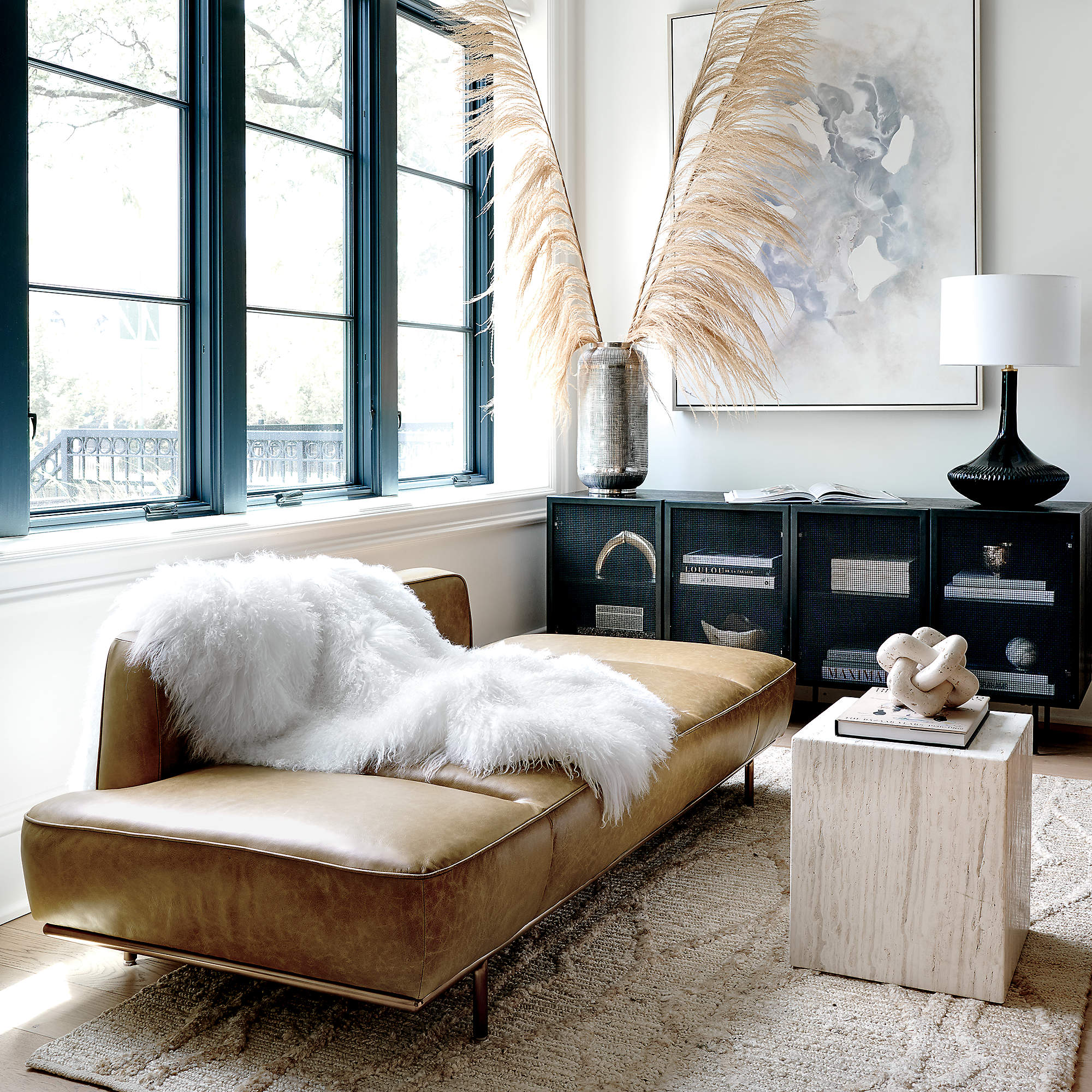 living room with SADDLE LEATHER DAYBED WITH BRASS BASE