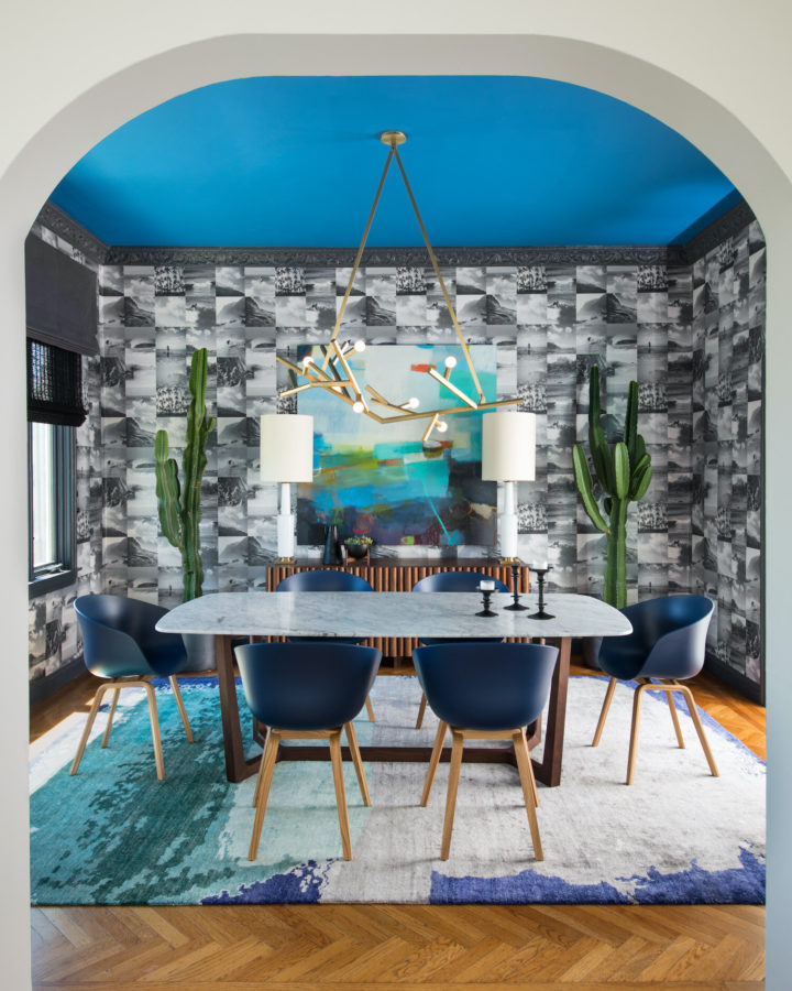 dining room with Unexpected wallpaper, deep jewel toned paint
