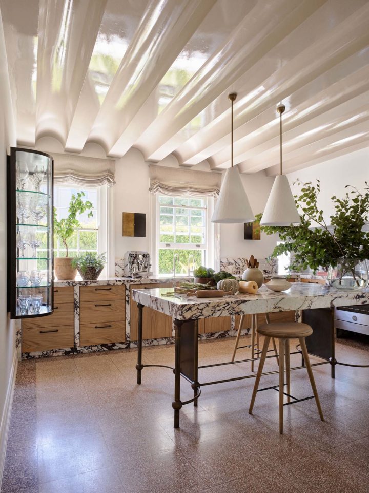 marble kitchen with unique ceiling
