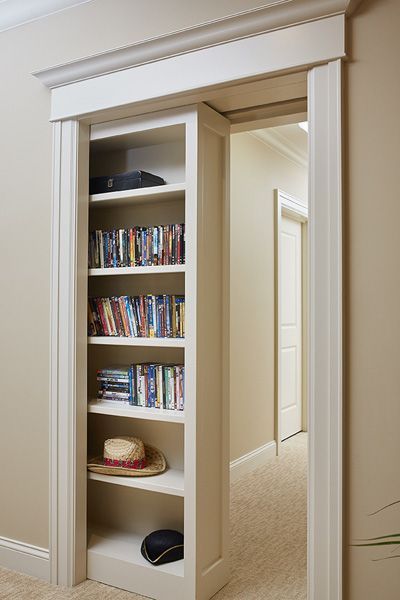 Hidden white bookcase pocket door