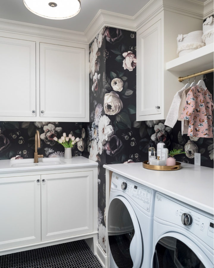 laundry room with dramatic floral wallpaper