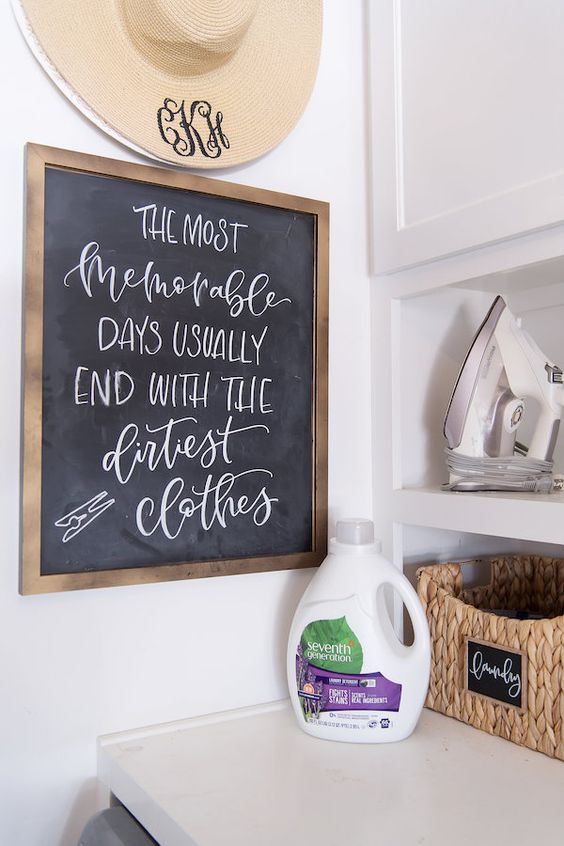 laundry room with framed chalkboard