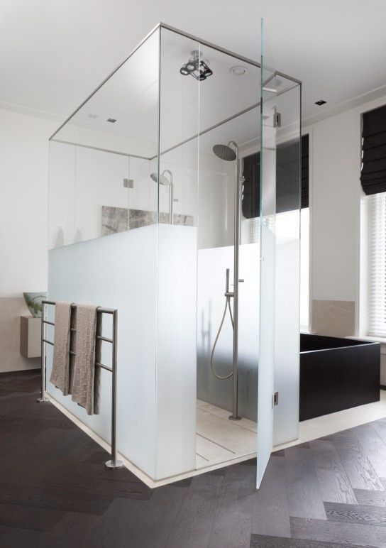 Bedroom-with-shower-in-glass-box