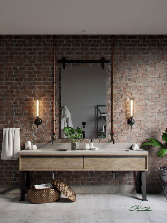 industrial-bathroom-with-exposed-brick-wall-and-concrete-floor