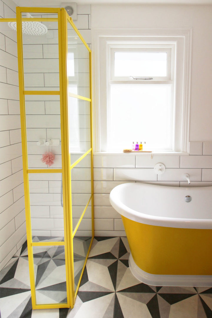 yellow-framed-glass-shower-door