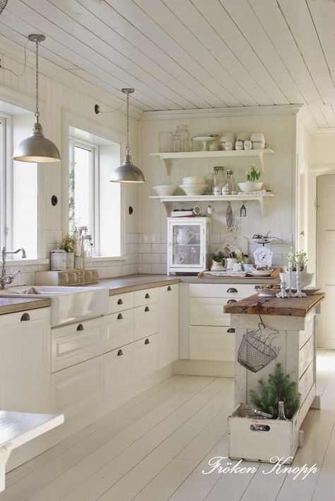 country cream kitchen cabinets