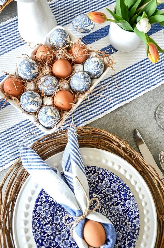 blue Easter table settings with Easter Bunny Napkin folder