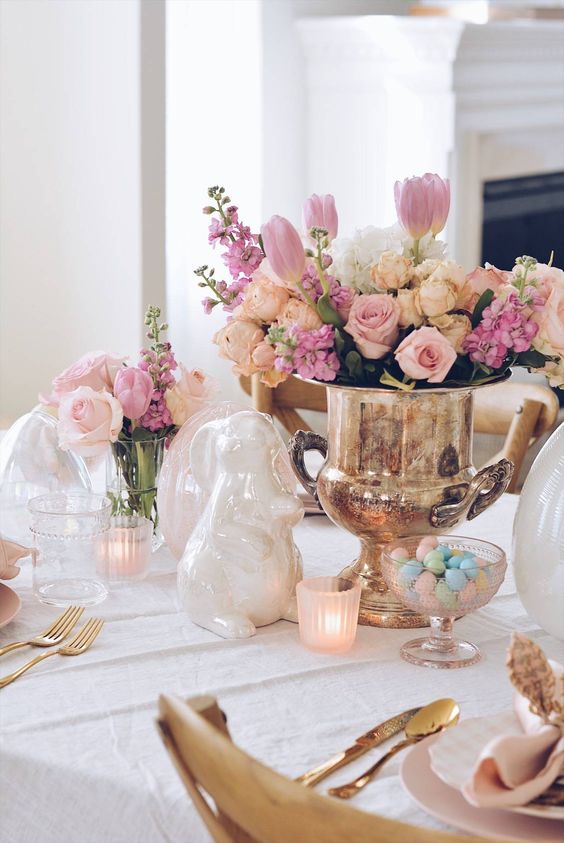 Easter table centerpiece with vintage ice bucket with fresh pink spring flowers