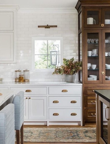 white kitchen with wood furniture