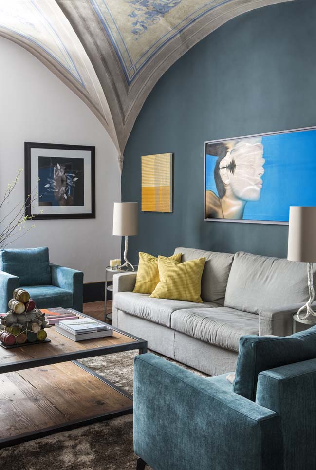 modern contemporary living room with mellow yellow pillows and art