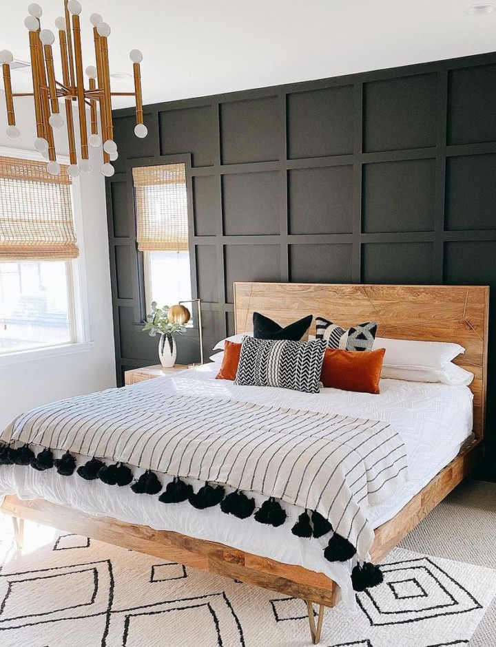 bedroom with black wood accent wall