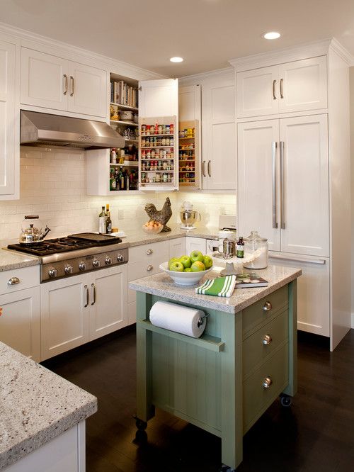 small kitchen with green trolley island