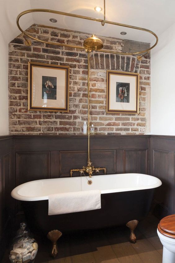 bathroom with Wainscoting brick wall and free standing bathtub
