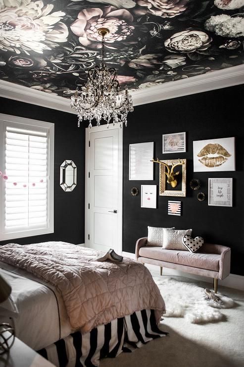 black and white bedroom with floral ea;;paper on ceiling