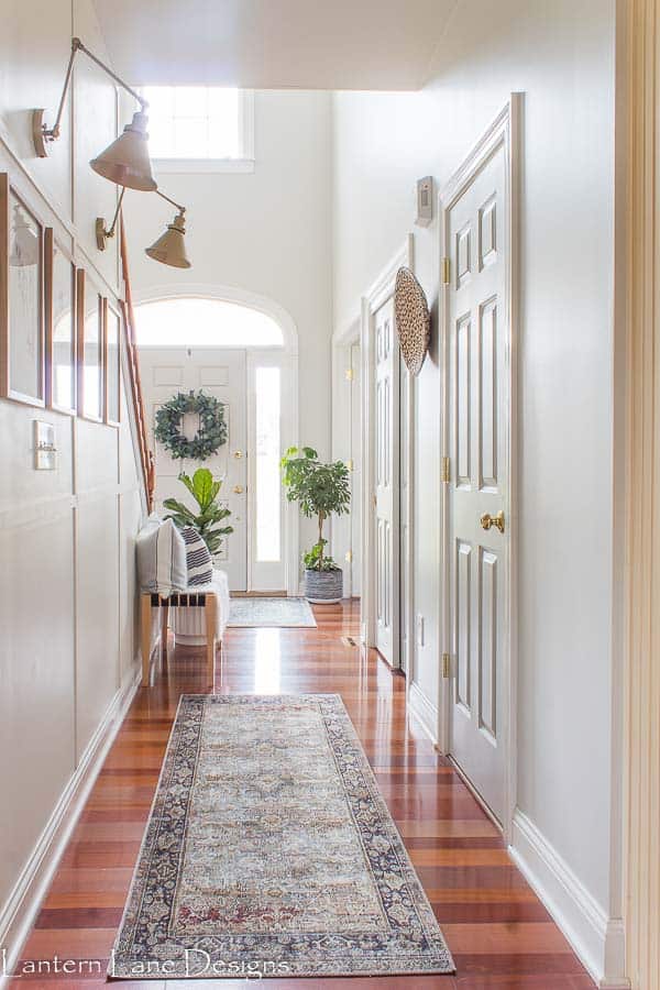 narrow hallway with scones