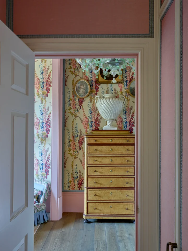 pink Pierre Frey fabric covers the dressing room walls